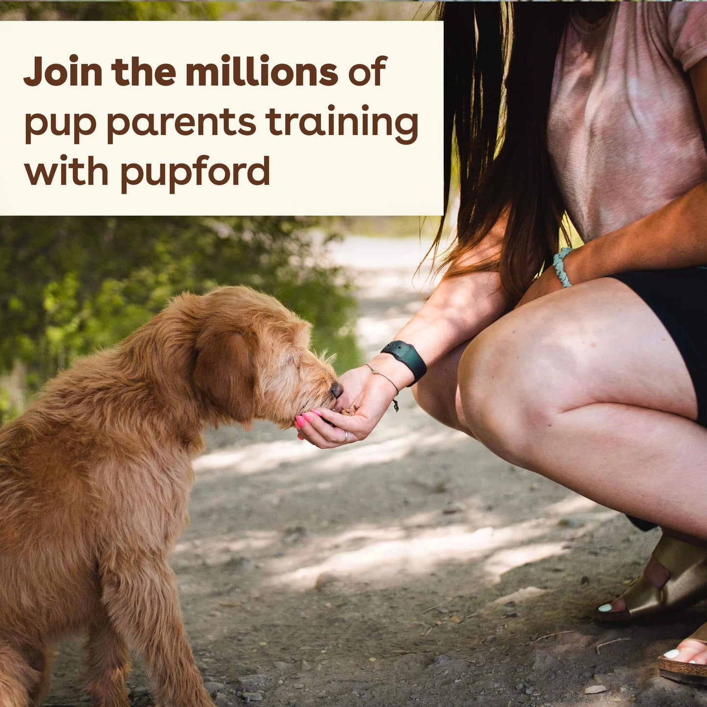 a woman giving treats to her dog with the text 'join the millions of pup parents training with pupford' | Pupford
