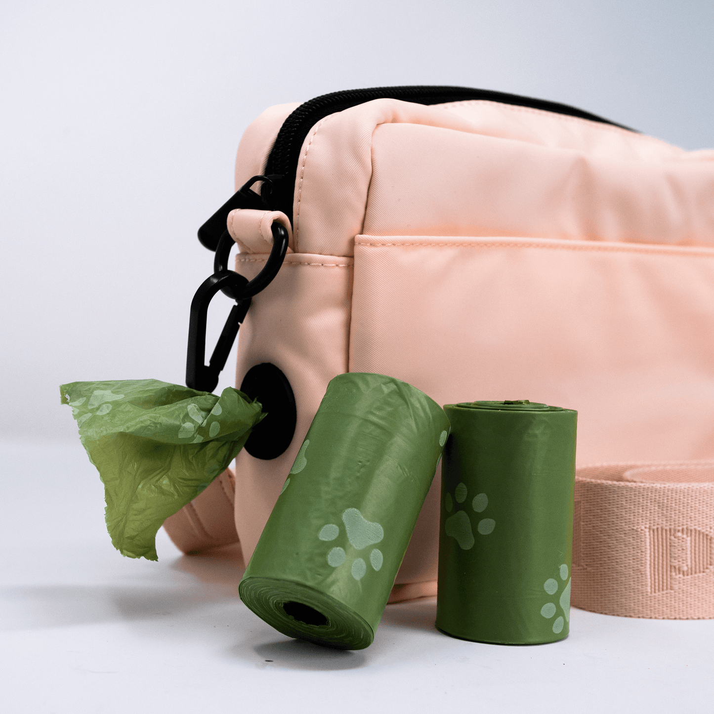 close up of poop roll holder in training treat pouch