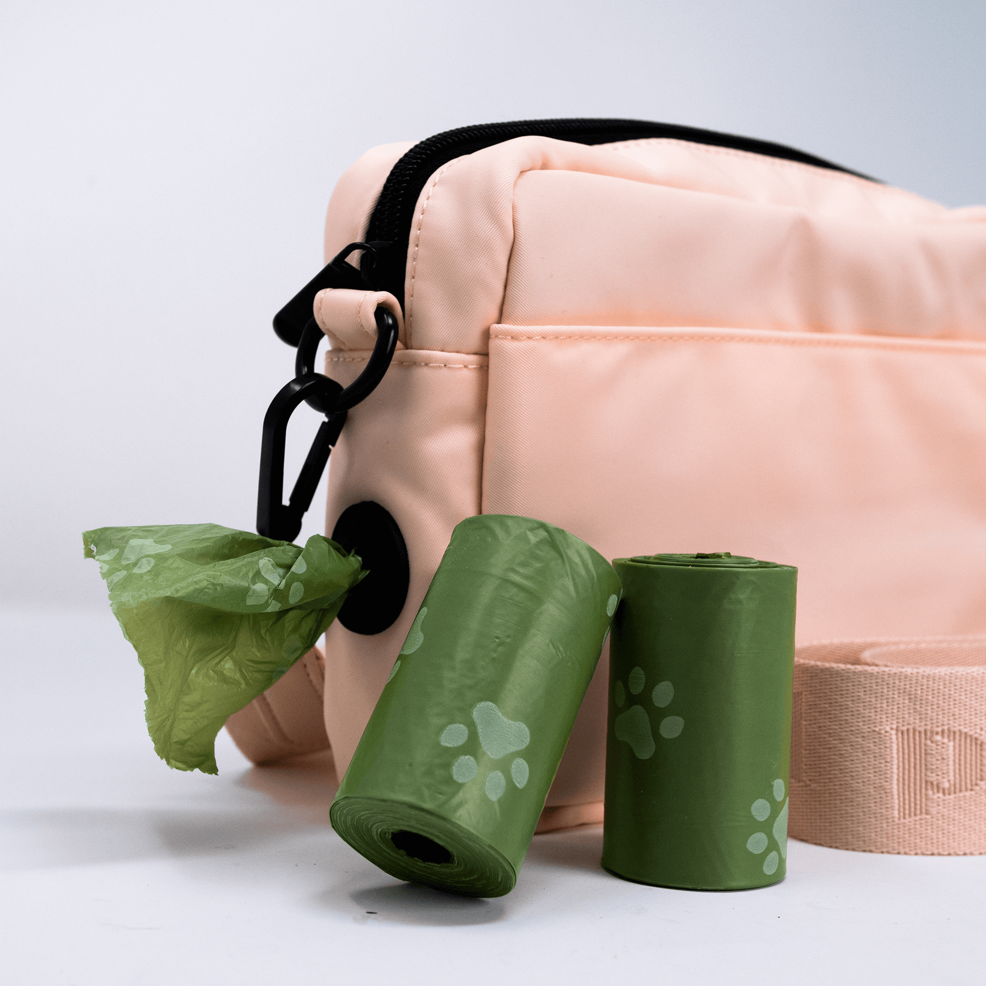 close up of poop roll holder in training treat pouch