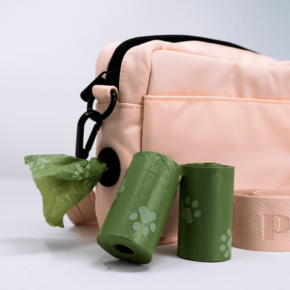 close up of poop roll holder in training treat pouch