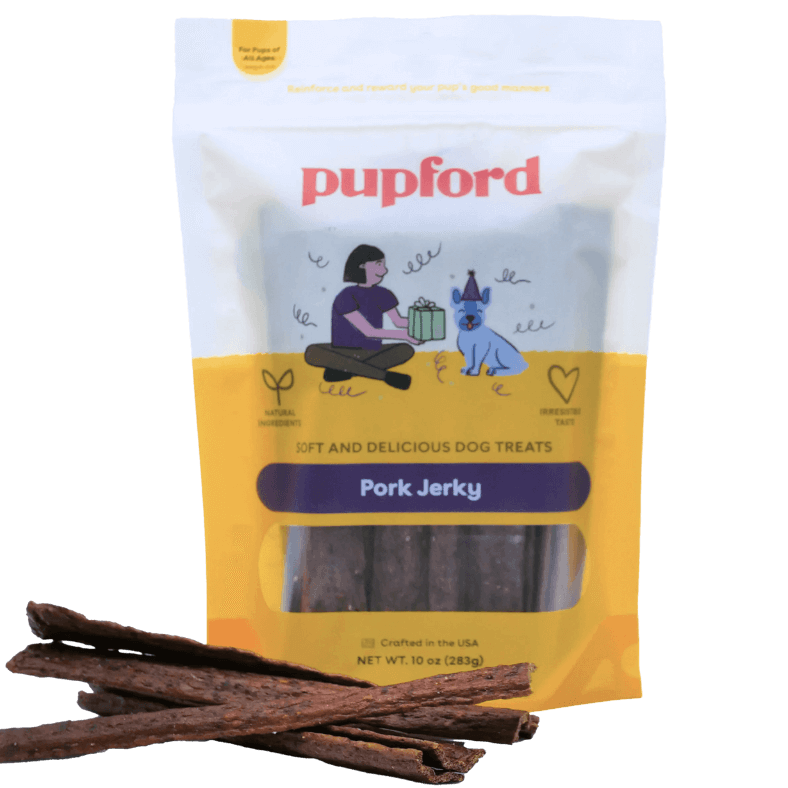 soft pork jerky treats laid in a pile in front of a bag of pork jerky | Pupford