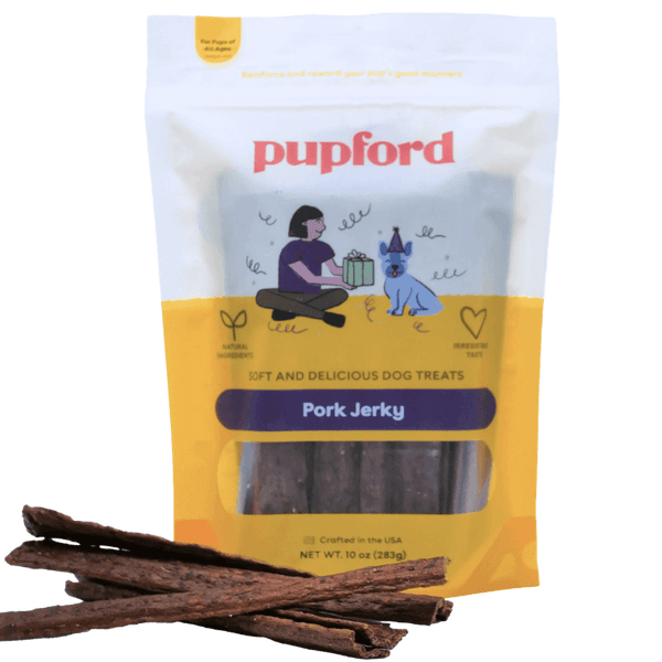 soft pork jerky treats laid in a pile in front of a bag of pork jerky | Pupford