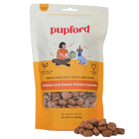 8 oz bag of chicken and sweet potato dog treats with a pile of treats in front of the bag | Pupford