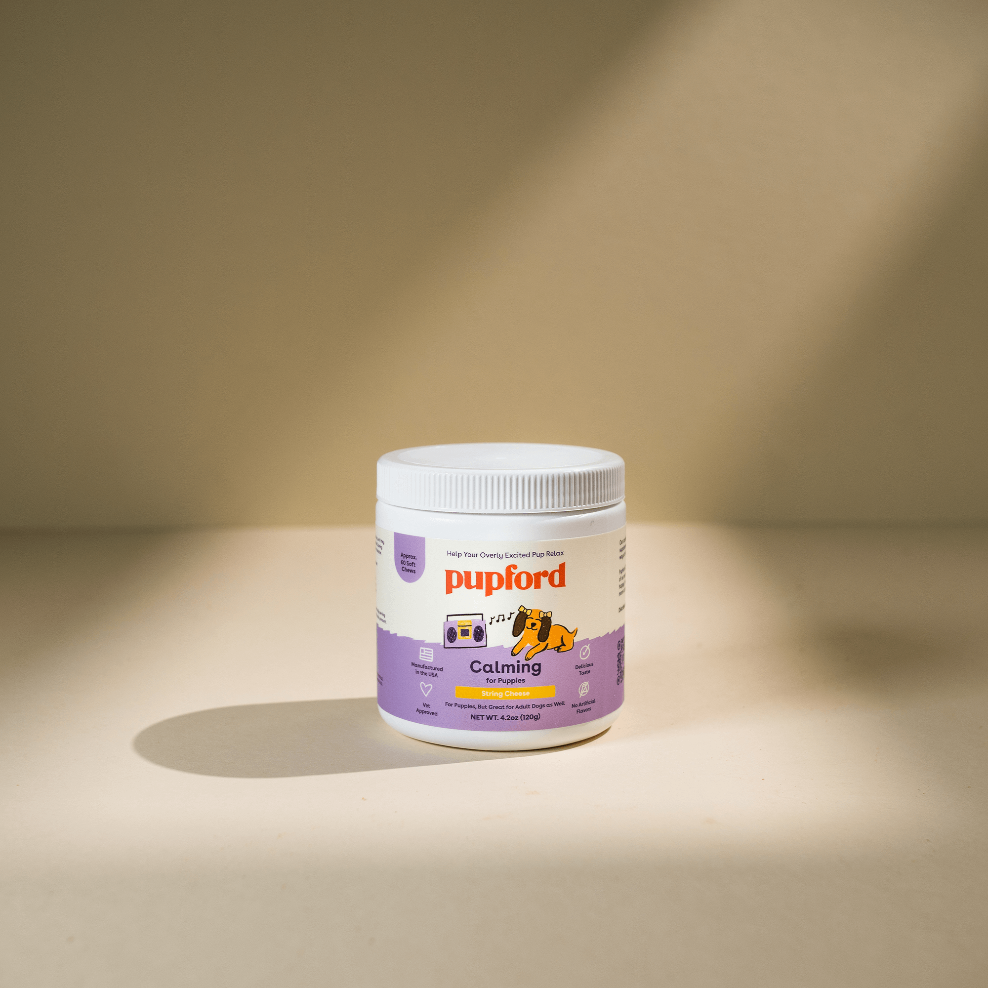 tub of puppy calming treats on a soft background | Pupford